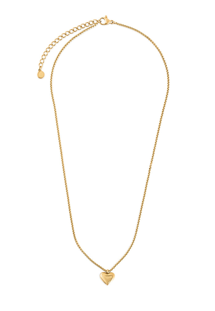 Gold necklace with a heart pendant on a white background