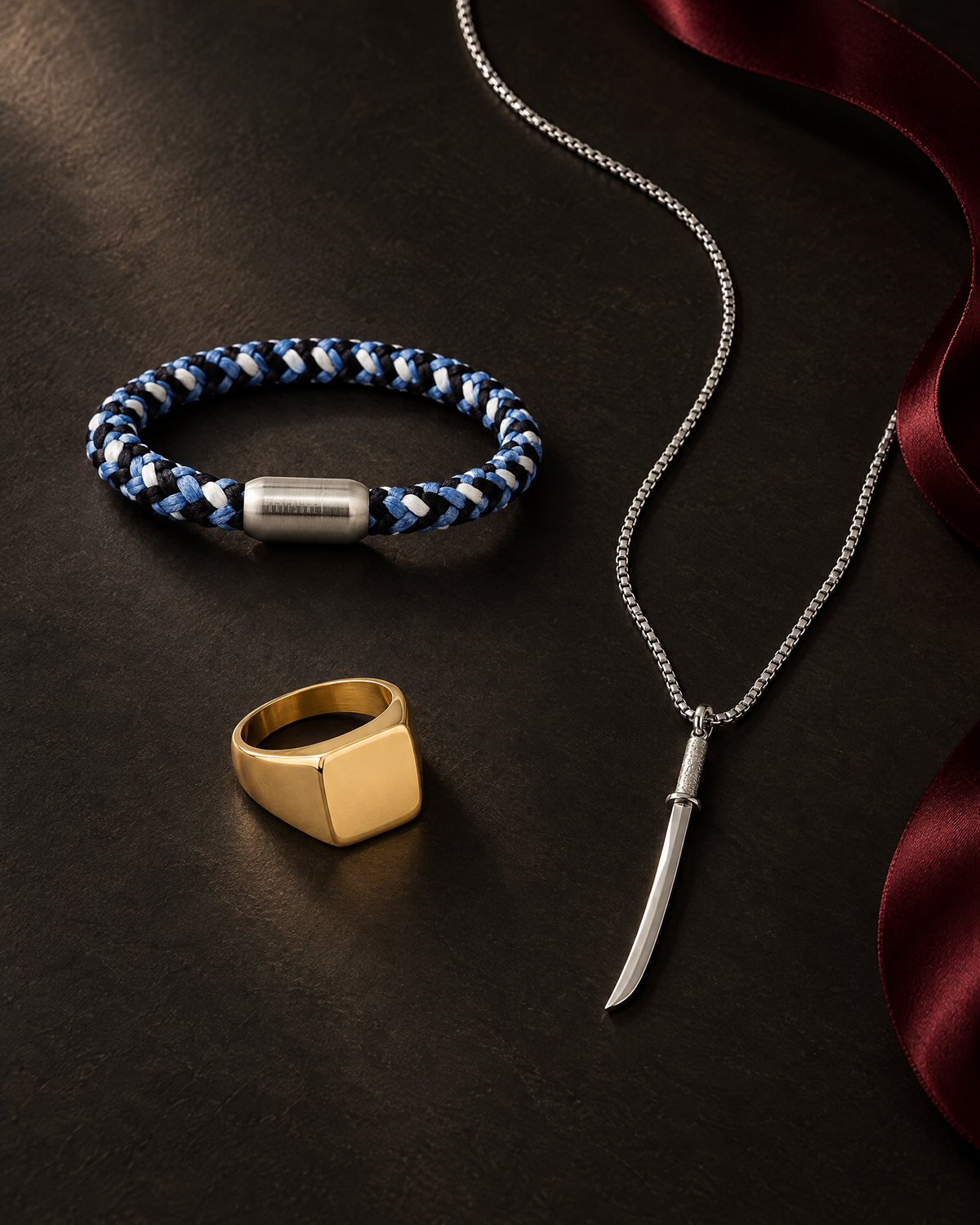 Akitsune Solida ring, Portus rope bracelet and Gladius necklace with burgundy ribbon
