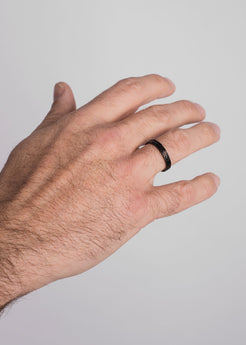 AK-R-ARG-01-Argius-Meander-Ring-Black-LifestyleN1QzJnLUtAOme