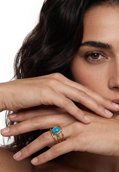 Akitsune Alina ring in gold tone, close-up on a model