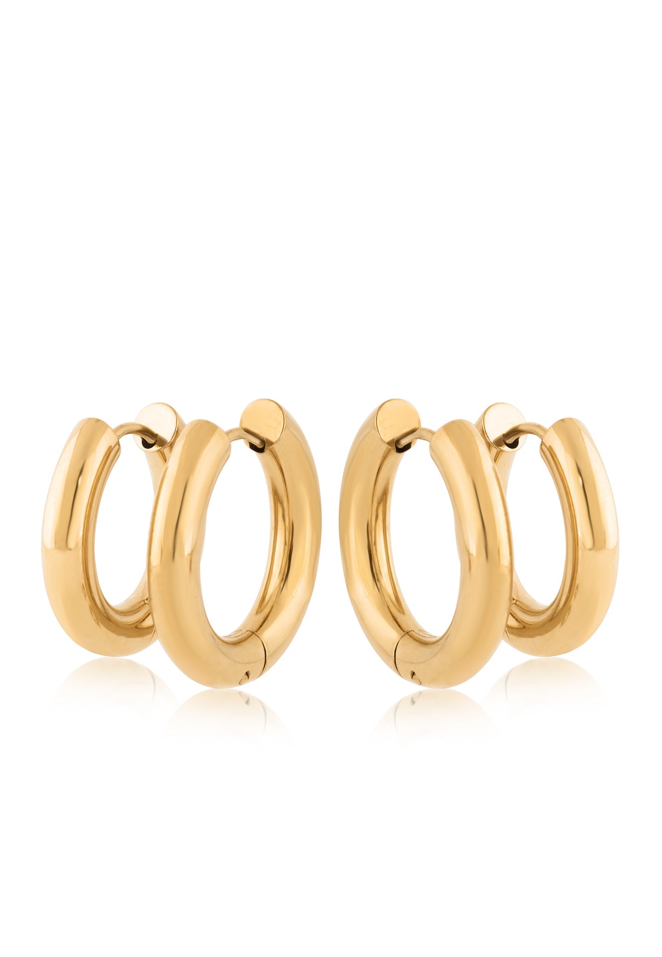 Pair of gold hoop earrings on a white background