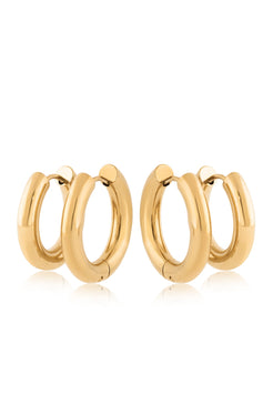 Pair of gold hoop earrings on a white background