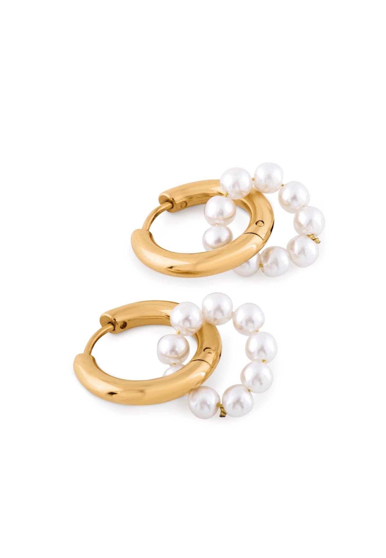Gold hoop earrings with pearl accents on a white background