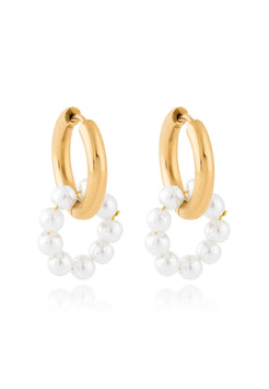 Gold hoop earrings with pearl accents on a white background