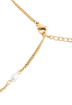 Gold chain necklace with a small white pearl on a white background
