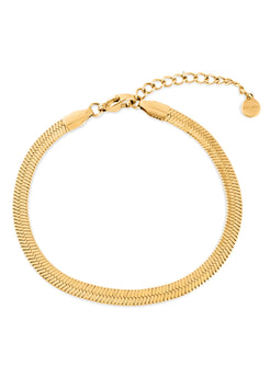 Gold bracelet on a white background
