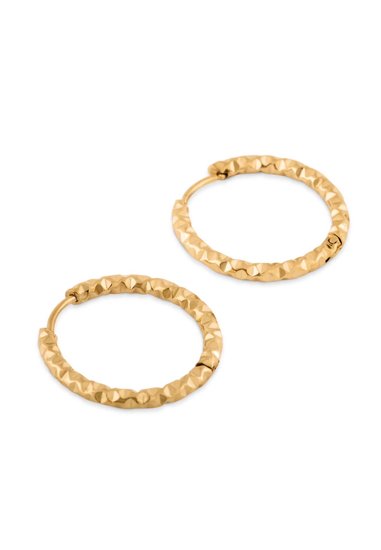 Gold hoop earrings with a textured finish on a white background
