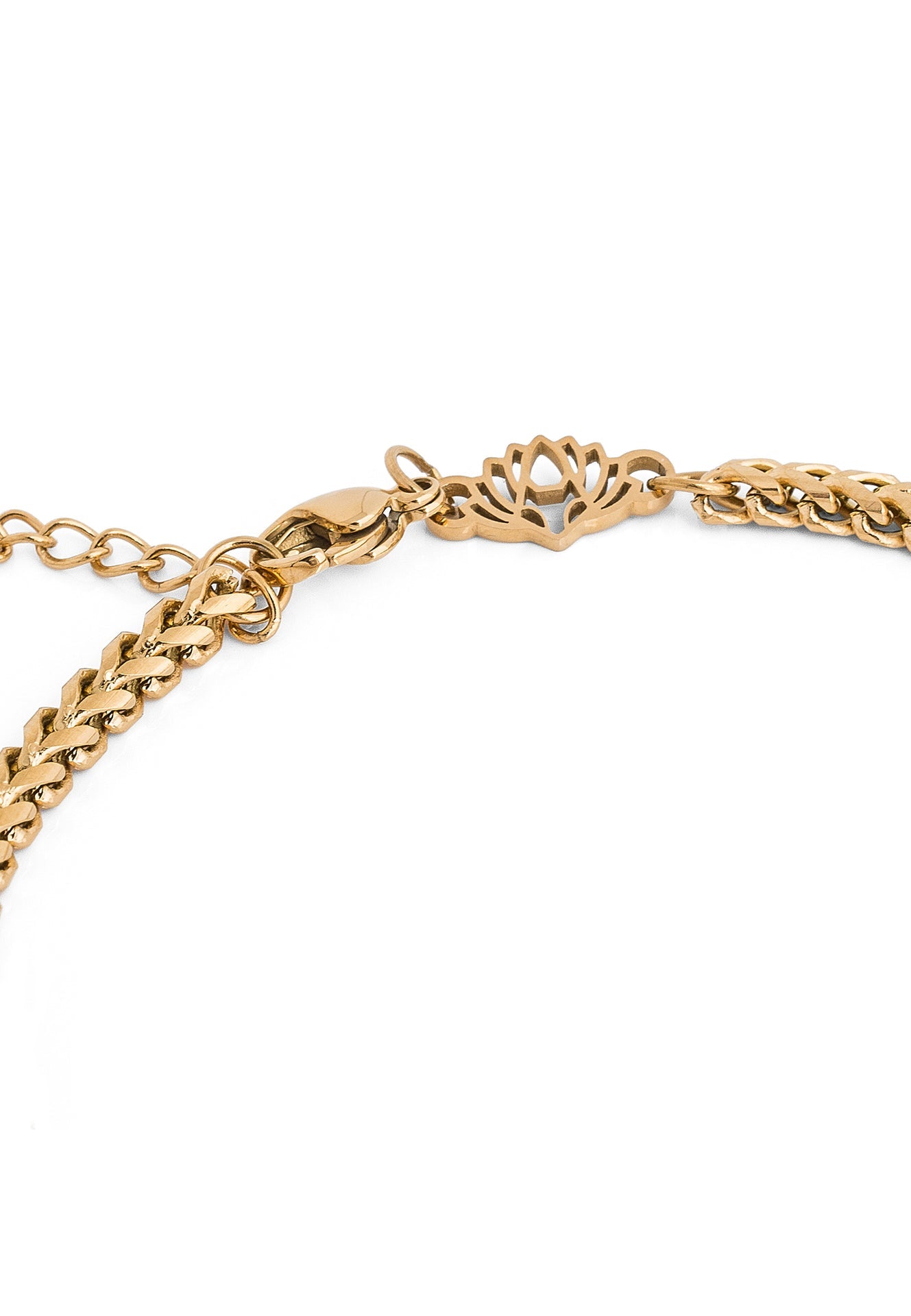 Gold chain bracelet on a white background