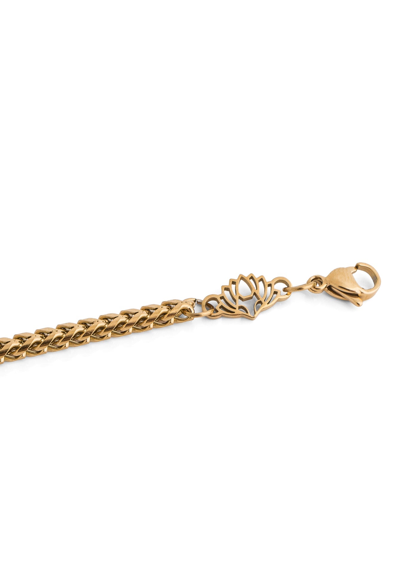 Gold bracelet on a white background