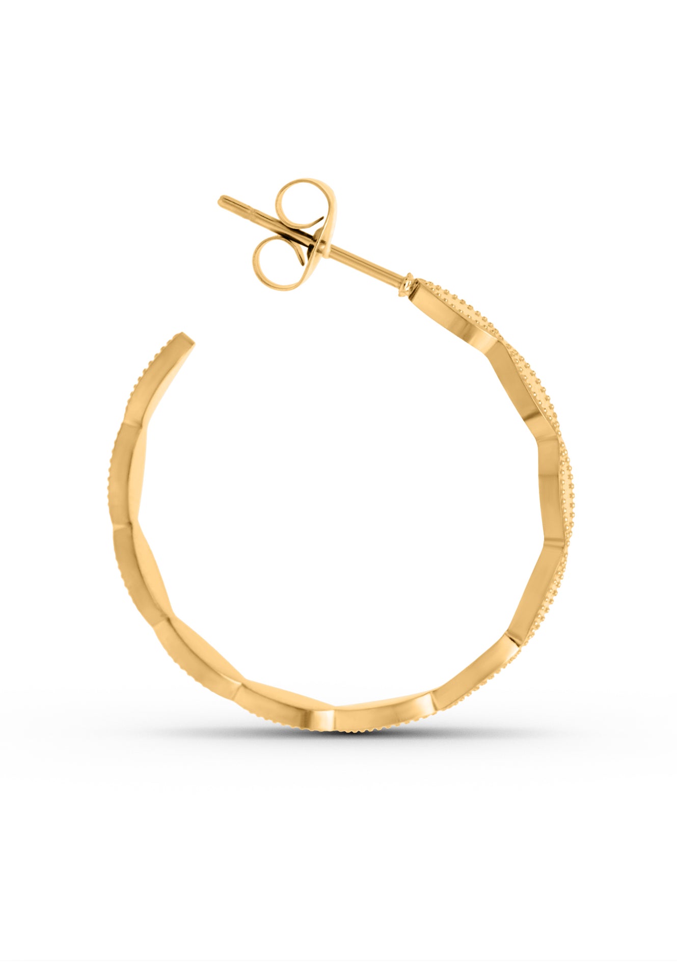 Gold hoop earring on a white background