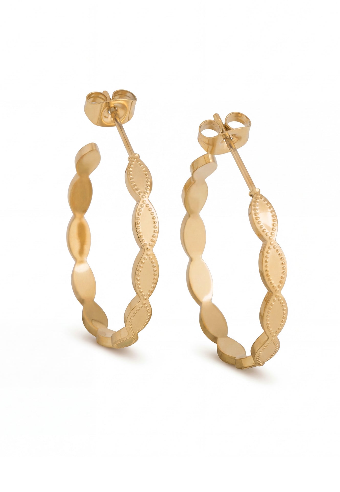 Gold hoop earrings on a white background