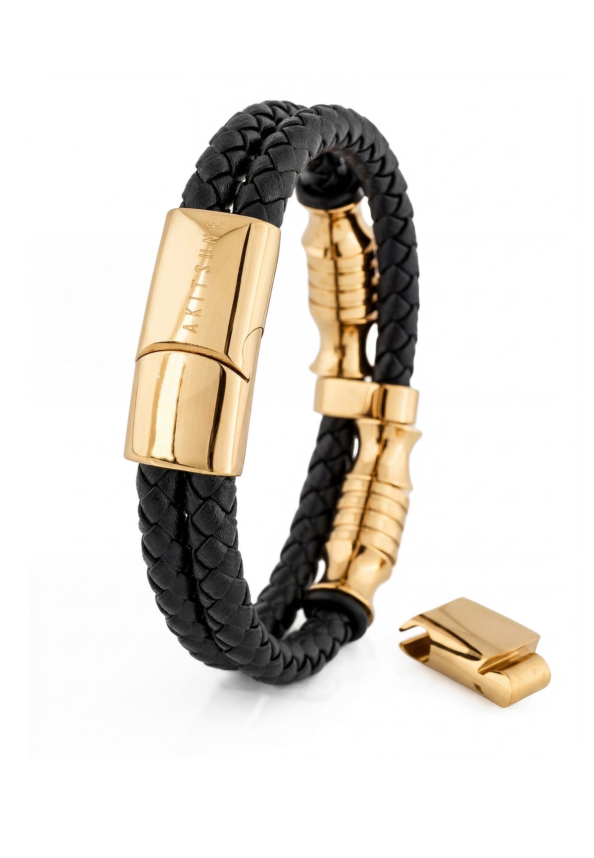 Black braided bracelet with gold clasp on a white background