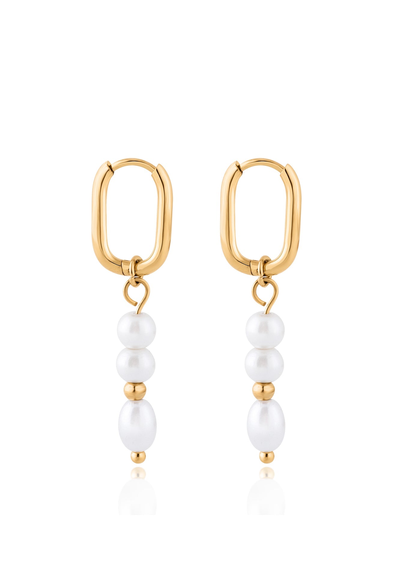 Gold hoop earrings with pearl drops on a white background