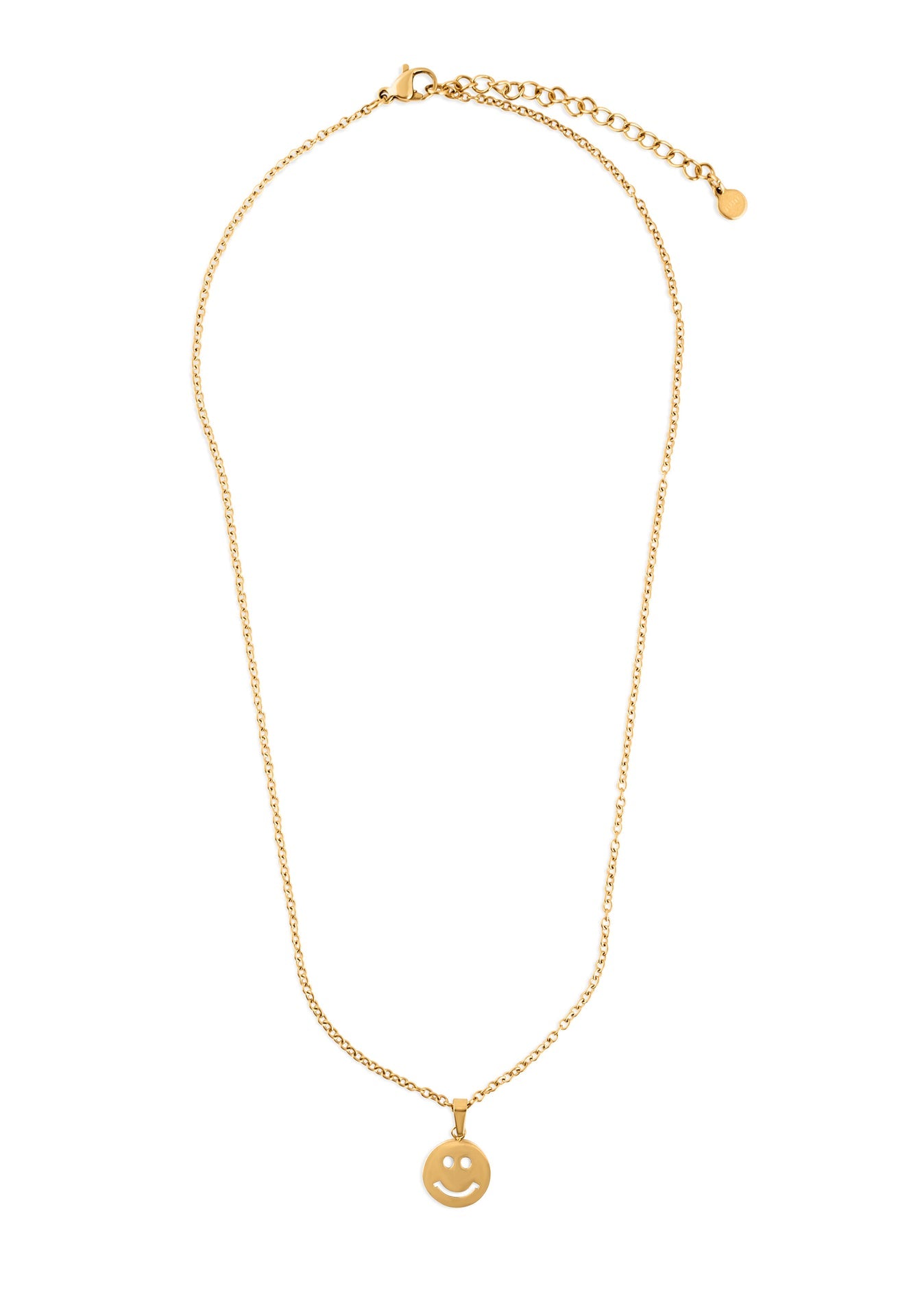 Gold necklace with a smiley face pendant on a white background
