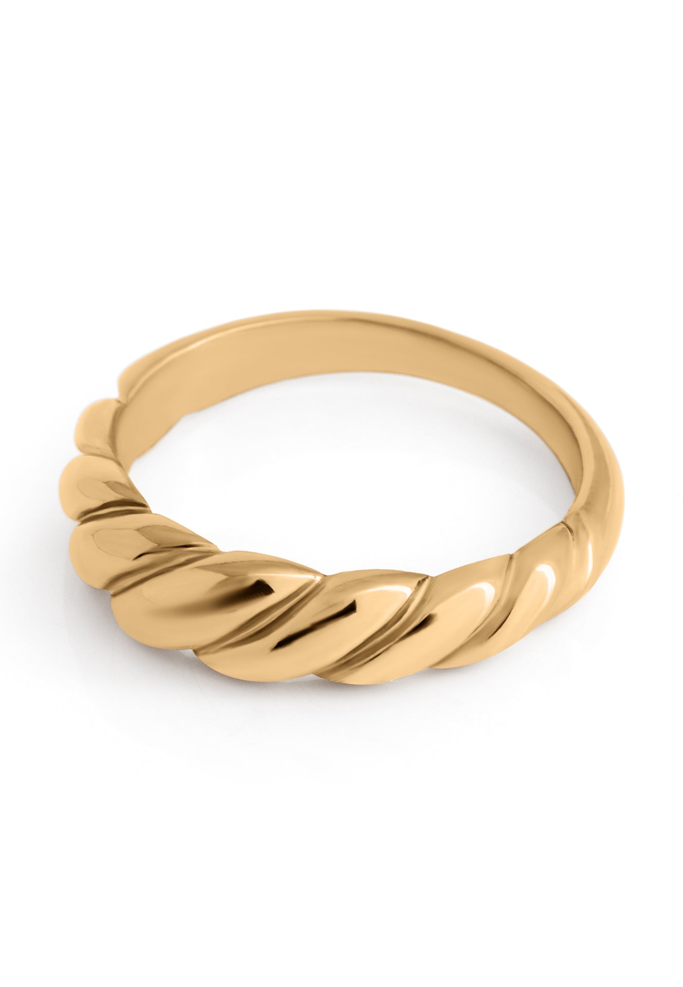 Gold ring with a textured design on a white background