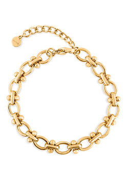 Gold chain bracelet on a white background