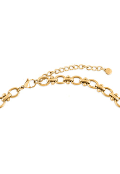 Gold bracelet on a white background