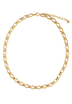 Gold chain necklace on a white background