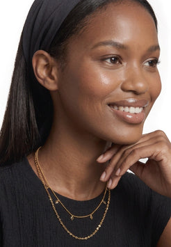 Akitsune Reverie Necklace Set gold tone, worn by a model