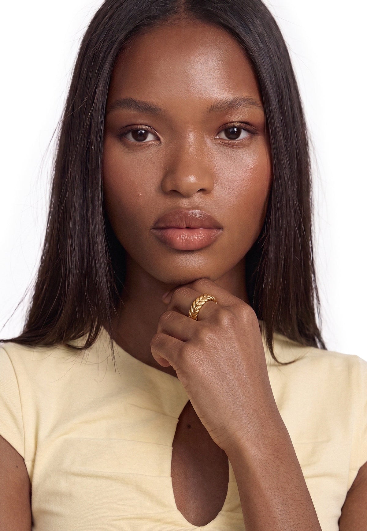 Akitsune Vesper ring in gold tone, close-up on a model