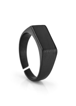Black ring with a unique design on a white background.
