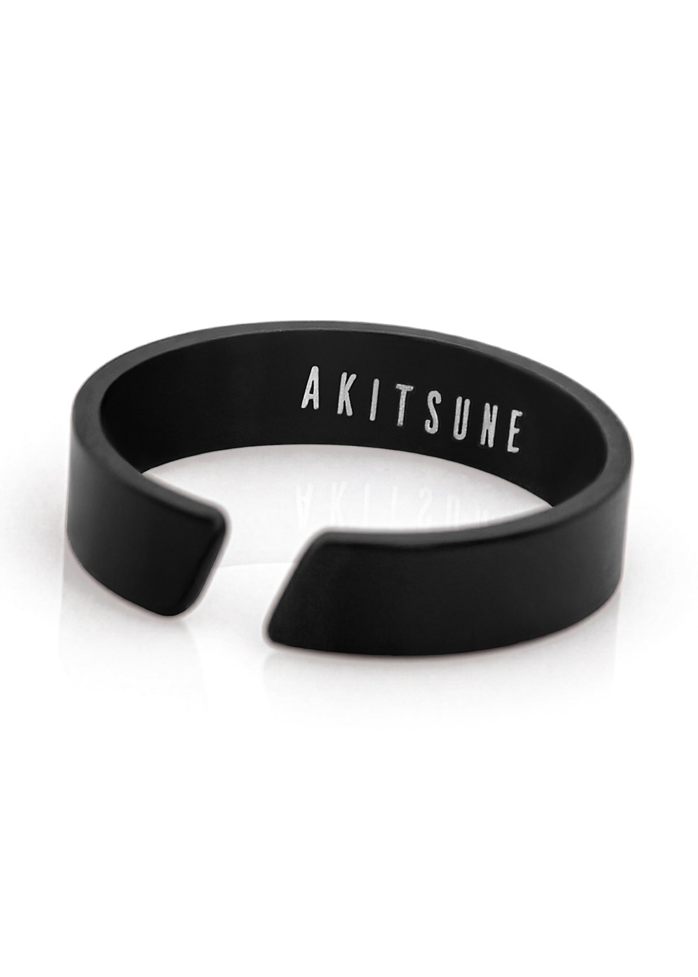 Black bracelet with 'AKITSUNE' branding on a white background