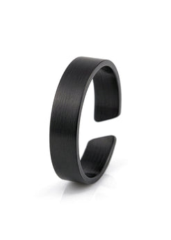 Black metal bracelet on a white background