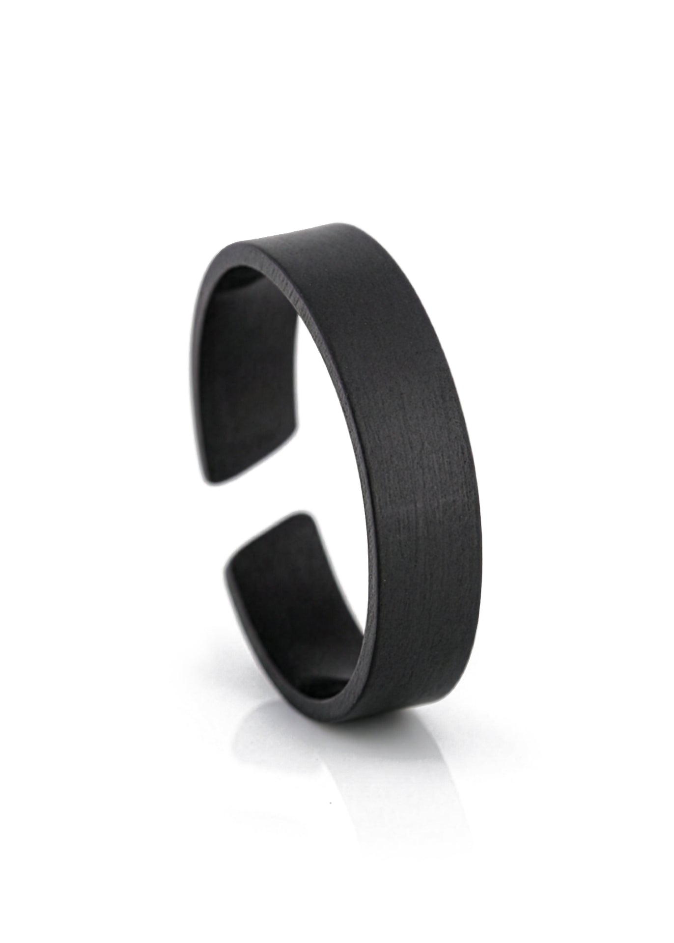Black metal bracelet on a white background