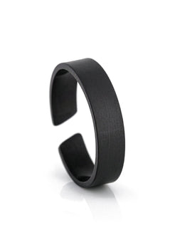 Black metal bracelet on a white background