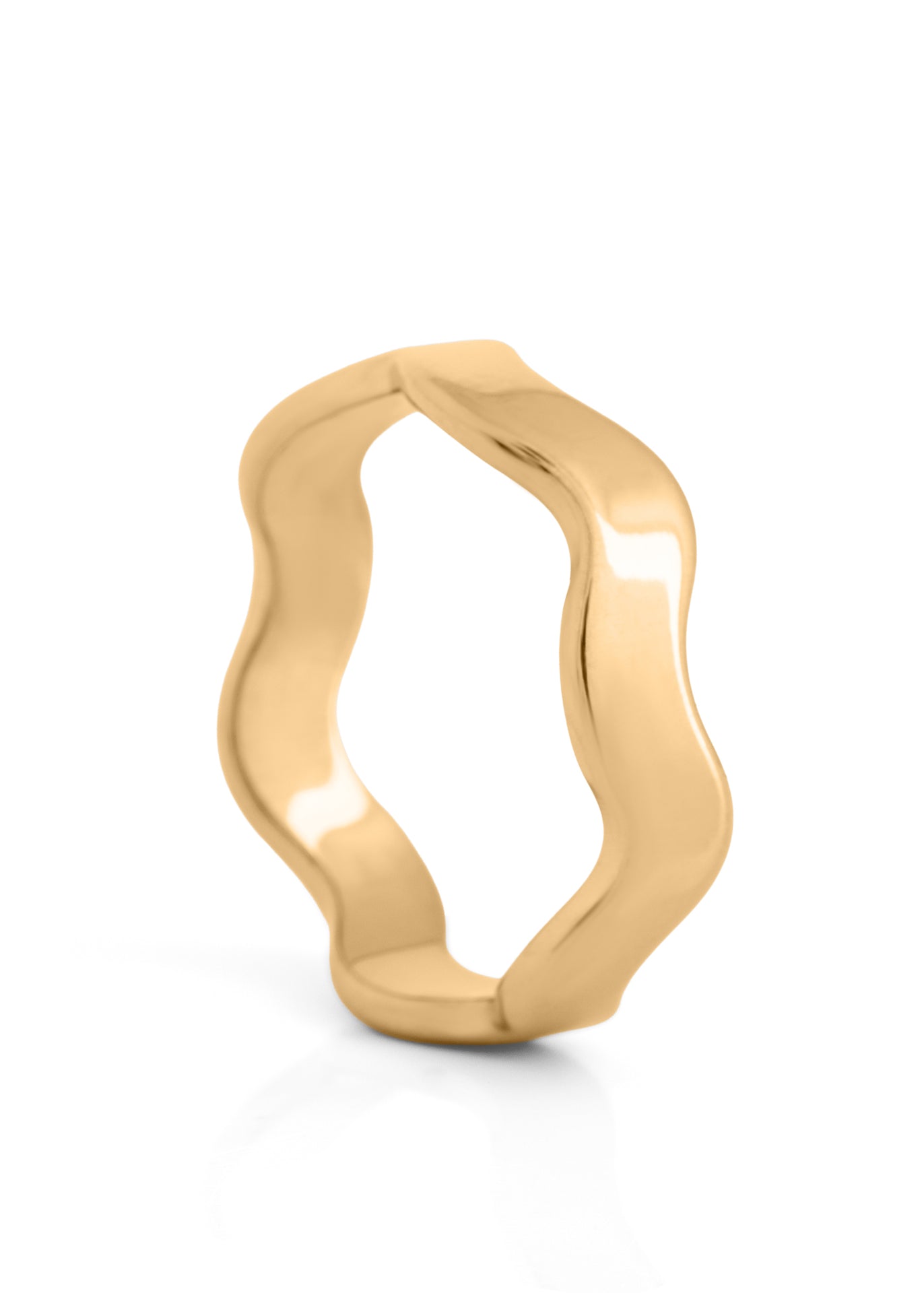 Gold ring with a wavy design on a white background