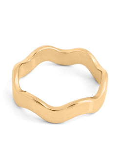 Gold ring with a wavy design on a white background