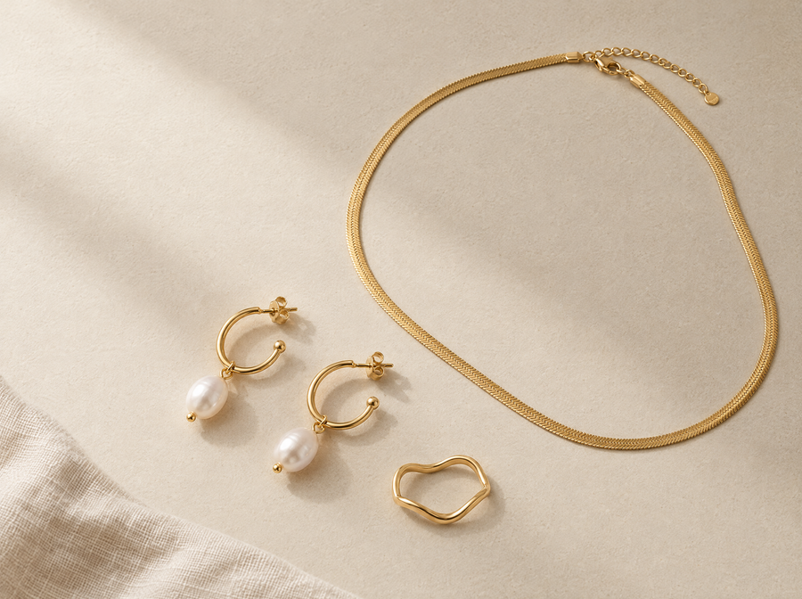 Akitsune women’s jewelry collection on an ivory background